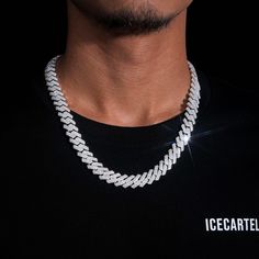 ICECARTEL exclusive 10MM Round Cut Moissanite Cuban Link Chain 14K Gold is now available, made of 925 sterling silver and PVD plated with a thick layer of 14K Gold. This moissanite cuban link chain weighs exactly 341.7 grams and has a total diamond carat weight of 10.15 CTW. This moissanite cuban link chain is iced out with round, colorless (D-Color), VVS moissanite flawless diamonds, placed in a pave and channel diamond setting. All of the diamonds on this moissanite cuban necklace are guarante Moissanite Chain, Cuban Necklace, Custom Jewelry Box, Flawless Diamond, Vvs Diamond, Leather Jewelry Box, Diamond Simulant, Box Clasp, Moissanite Jewelry