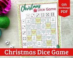 the christmas dice game is next to some ornaments and other holiday decorations with text overlay that reads christmas dice game