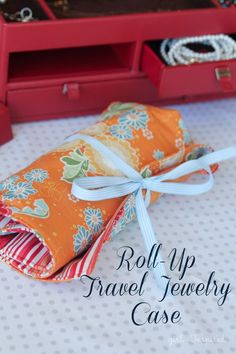 roll up travel jewelry case with ribbon on top