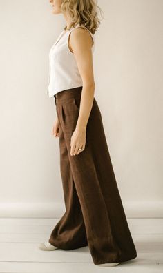 "ETHICALLY MADE. Every linen Palazzo pants is handmade using the body measurements of the individual customer. No factory use. Every creative and sewing task is fairly rewarded. Color in the picture- chocolate. Other colors are available. DESCRIPTION: Linen Pants: -Wide leg -Two front pockets -Two back pockets -Wide waist line -Zipper -Handcrafted Material: 100 % softened Lithuanian linen, medium weight, 205 g/m2. Fabric of this linen Palazzo pants IS WASHED BEFORE SEWING. Therefore you do not n Brown Linen Trousers Outfit, Brown Linen Pants Outfit, Brown Linen Trousers, Linen Trousers Outfit, Brown Linen Pants, Linen Palazzo Pants, Vest Linen, Linen Pants For Women, Wide Leg Pants High Waisted