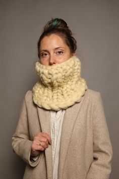 This hand knitted neck warmer is the warmest and coziest scarf you have ever had! Perfect for cold and windy days. All our knitted scarves and hats are made from natural merino wool. It's a very warm and soft material just perfect for the skin, you will be pleasantly surprised by your purchase! There is an Ivory color scarf in the pictures.  The length of the scarf is 45cm (around the neck) and the width is 20 cm. Available to order a set of knitted hat and scarf just for 95$ - a better price than separate items. ORDER DETAILS - Usually, it takes 2-3 days to knit and ship the scarf. - Any scarf is available in more than 20 different colors! - Don't hesitate to contact us :) My grandma will be happy to make a special winter gift for people you love! WASHING Hand clean only. Use liquid deter White Wool Scarves For Winter, White Wool Scarf For Winter, Cozy Hand-knitted Alpaca Scarves, Cozy Hand Knitted Yarn Scarves, Cozy Hand Knitted Scarves, Cozy Hand-knitted Scarves, Cozy Crochet Scarves For Cold Weather, Hand Knitted Cozy Scarf For Winter, Cozy Handmade Yarn Scarf