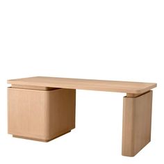 a wooden desk sitting on top of a white wall