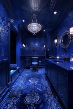 a fancy bathroom with blue walls and flooring