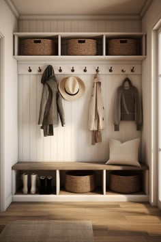 a coat rack with hats and coats hanging on the wall next to two bins