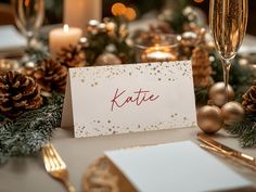 a place setting with pine cones and candles