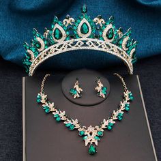 Indulge in royalty with our 3 pcs Crown Sets Royal Queen Princess Tiara Necklace Set. This glamorous jewelry set features a stunning tiara adorned with teardrop crystals, a center high point, and a pendant necklace with matching earrings. Perfect for your special occasion, elevate your look and feel like a true queen. materail: metal, crystal color: as shown type: jewelry set tiara, necklace, earrings Height:: around 6.8 cm Diameter:: around 15 cm Fantasy Jewelry Magic, Fairytale Wedding Gown, Tiara Necklace, Bridal Hair Bands, Crystal Crown Tiaras, Jewelry Magic, Glamorous Jewelry, Floral Hair Pins, Queen Princess