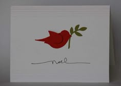 a card with a red bird on it and the word noel written in cursive writing