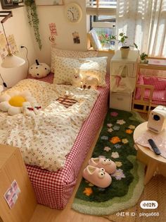 a bed room with a neatly made bed and stuffed animals on the floor next to it