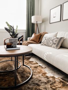 a living room filled with furniture and decor