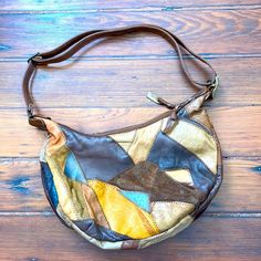 Vintage 70's 100% leather patchwork shoulder purse  12.5x8.5x2.5 Multicolor Leather Patchwork Shoulder Bag, Retro Brown Leather Hobo Bag, Retro Soft Leather Shoulder Bag, Retro Patchwork Shoulder Bag For Everyday Use, Retro Style Patchwork Shoulder Bag For Everyday Use, 70s Bags Vintage, Retro Brown Hobo Bag With Adjustable Strap, Retro Patchwork Bags For Everyday Use, Vintage Brown Patchwork Shoulder Bag