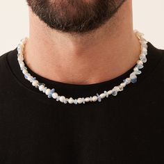 If it's not the real deal, it's not CRAFTD. This necklace features Genuine Clear Blue Quartz hand-strung alongside all-natural freshwater pearls. Each pearl is unique and sourced directly from Mother Nature, ensuring a one-of-a-kind piece for your collection. With its premium lobster clasp and adjustable length, customization is effortless. Wear it solo as a statement piece, or layer it with your favourite gold chains﻿ for a versatile and layered look. ✓ Real Freshwater Pearls✓ 18K Gold & 316L S Adjustable Blue Pearl Necklace With Polished Beads, Mens Real Pearl Necklace, Adjustable Polished Blue Pearl Necklace, Luxury Blue Baroque Pearl Necklaces, Luxury Blue Baroque Pearl Necklace, Ice Necklace, Minimal Bracelet, Real Pearl Necklace, Silver Pearl Necklace