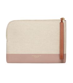 Westman Atelier Metier Makeup Bag Midi in Herringbone and Mauve Front High-end Clutch With Removable Pouch, Luxury Top Handle Pouch For Daily Use, Designer Clutch For Daily Use, Designer Clutch With Dust Bag For Travel, Luxury Pouch With Case For Everyday Use, Luxury Pink Pouch For Everyday Use, Designer Clutch Pouch, Designer Travel Clutch, Luxury Rectangular Pouch For Everyday