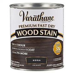 a can of wood stain on a white background