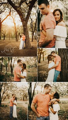 a couple embracing each other in front of a tree with the sun shining through it