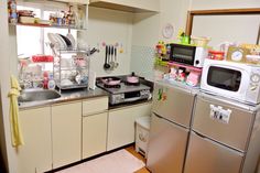 the kitchen is clean and ready to be used as a family room or playroom