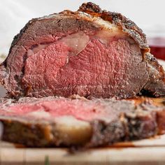 a piece of meat sitting on top of a cutting board