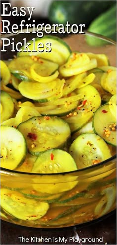 a glass bowl filled with sliced cucumbers