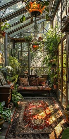 the inside of a greenhouse with plants and rugs on the floor in front of it