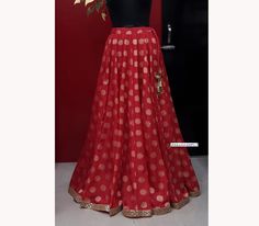 Made to Order/Made to Measurement/Custom Made Indian Lehenga Skirt (PLEASE NOTE THIS IS SKIRT ONLY) - Fabric: Brocade Silk - Color : Red - Fully Flared Kalidaar (Paneled) Skirt - Lined - Gold Sequins Border - Drawstring with beautiful  gold latkan - No can can This is Made To Order and we require following measurements in inches. 1. Waist of Skirt 2. Length of Skirt PLEASE NOTE: BUYERS ARE RESPONSIBLE FOR ANY CUSTOMS AND IMPORT TAXES THAT MAY APPLY. Fabric Care : Dry Clean Only Disclaimer: The a Traditional Wedding Sharara With Tiered Skirt, Traditional Tiered Lehenga For Reception, Traditional Lehenga With Tiered Skirt For Reception, Traditional Lehenga For Reception With Tiered Skirt, Wedding Lehenga With Tiered Skirt For Diwali, Wedding Festival Tiered Skirt Sharara, Fitted Tiered Skirt Lehenga For Festivals, Wedding Choli With Tiered Skirt For Festivals, Festive Wedding Lehenga With Tiered Skirt