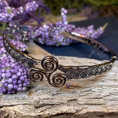 TAKE AN ADDITIONAL 20% OFF THE ALREADY REDUCED SALE PRICE - ADDITIONAL 20% IS DEDUCTED AT CHECKOUT with code SAVE20 Stunning and very lovely! Our "The Strength of Three," Triskele Celtic knot Bangle Bracelet is a must have. It is embraced on both sides by approximately 5/8" of a braided Celtic knotwork pattern which is defined by light antiquing. The remainder of the bangle is sleek and unadorned. A safety chain provides elegance and peace of mind! Rhodium over lead-free pewter throughout. A ric Spiral Bracelet, Celtic Spiral, Knot Bangle, Beautiful Symbols, Celtic Knotwork, Crystal Design, Safety Chain, Traditional Jewelry, Celtic Knot