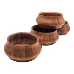 three wooden bowls sitting on top of each other