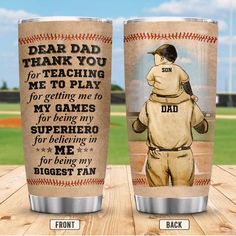 two coffee cups with baseballs on them and the words dear dad thank you for teaching me to play my game