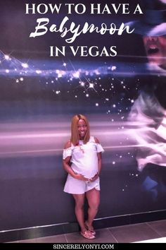 a woman standing in front of a sign that says how to have a babymoon in vegas