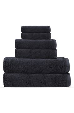 five black towels stacked on top of each other