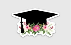 a sticker with flowers and a graduation cap on it's side, in the shape of a flower border