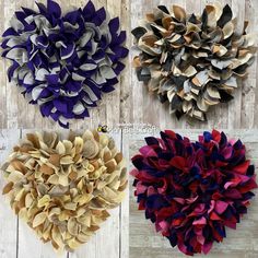 four different colors of fabric flowers on wooden boards