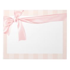 a card with a pink ribbon and bow on the front is blank for your text