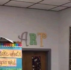 there is a sign that says take what's your mind on the wall in this classroom