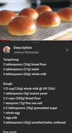 some bread rolls sitting on top of a cooling rack