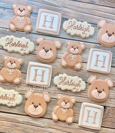 decorated cookies with teddy bears and the letters h on them are arranged next to each other