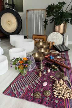 an assortment of decorative items displayed on a rug