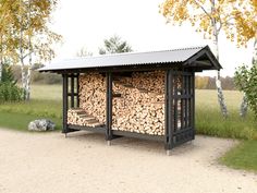 there is a small shelter made out of firewood