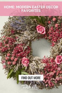 a wreath with pink flowers and greenery is featured in the article, find out more