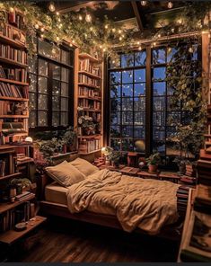 a bedroom with lots of bookshelves and plants