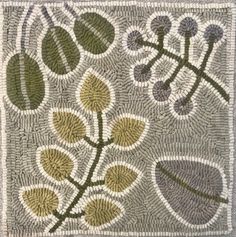 an image of a rug with flowers and leaves on the ground in grey, green and white colors