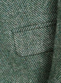 Looking for a trendy and stylish outfit for that big meeting or special occasion, our Harris Tweed Wide Herringbone Green Jacket is an ideal pick. Crafted from pure wool, the jacket has a sturdy yet sumptuous finish, special enough to create a sizzling impression, also the herringbone pattern on the outfit creates a chic silhouette making you look sophisticated. 
 
 Look Includes  Harris Tweed Wide Herringbone Green Fabric  Two Button Jacket Style  Wide Peak Lapel (3.75")  Horn Royal Black Butto Luxury Tailored Bespoke Tweed Jacket, Luxury Wool Herringbone Blazer, Green Tweed Jacket, Thrift Board, Herringbone Tweed Jacket, Leather Elbow Patches, Dandy Style, Barbie Box, Look Sophisticated