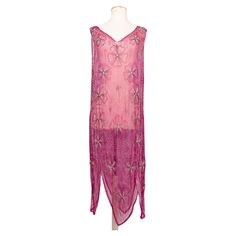 ANONYMOUS- Long evening dress composed of fuchsia silk embroidered with grey and white beads. No composition or size tag, it fits a size 38FR. Circa 1930s. Condition: Very good condition. tiny marks on the velvet Measurements: Bust 47 cm (17.71") -Hips: 50 cm (19.68") - Length: 127 cm (50") VR1047 Silk Velvet Dress, Velvet Evening Dress, Long Evening Dress, Haute Couture Dresses, Evening Gown Dresses, Runway Dresses, Brown Silk, Pink Outfits, Evening Dresses Long