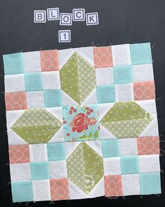 the block is made up of squares and flowers