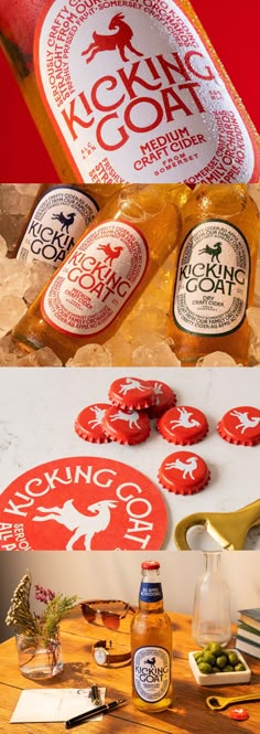 a bottle of beer sitting on top of a wooden table next to some cut up pieces of paper