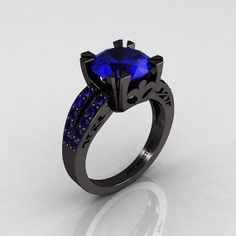 badass...Modern Vintage 14K Black Gold 3.0 Carat Blue Sapphire Solitaire Ring! Wow. This ring is gorgeous! https://www.etsy.com/shop/SelfiesNationLLC