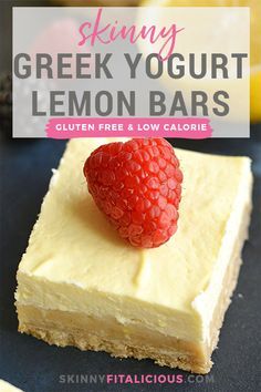 a close up of a piece of cake with a strawberry on top and the words skinnyy greek yogurt lemon bars above it