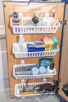 the bathroom shelf is organized with various items