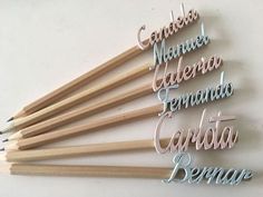 several pencils are arranged in the shape of letters and numbers that spell out names