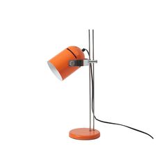 an orange table lamp with a black cord on the base and a white light behind it