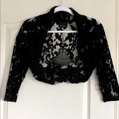 Brand New Queenspark (Australia) Long Sleeve Lace Bolero. I Bought It From Australia, Never Been Worn. Size Small. Statement Piece. This Listing Is For The Lace Bolero Only. Please Also See My Other Listing For The Matching Dress. Retail: 149.95 Elegant Winter Shrug For Night Out, Elegant Black Shrug For Spring, Black Winter Party Shrug, Black Shrug For Fall Party, Fitted Black Shrug For Night Out, Fitted Black Outerwear For Party, Chic Fitted Shrug For Night Out, Chic Shrug For Night Out, Winter Party Black Shrug