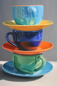 a stack of colorful cups sitting on top of each other